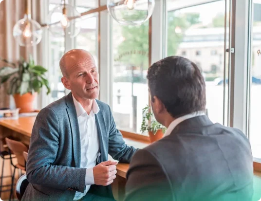 An Opsio advisor in conversation with a customer