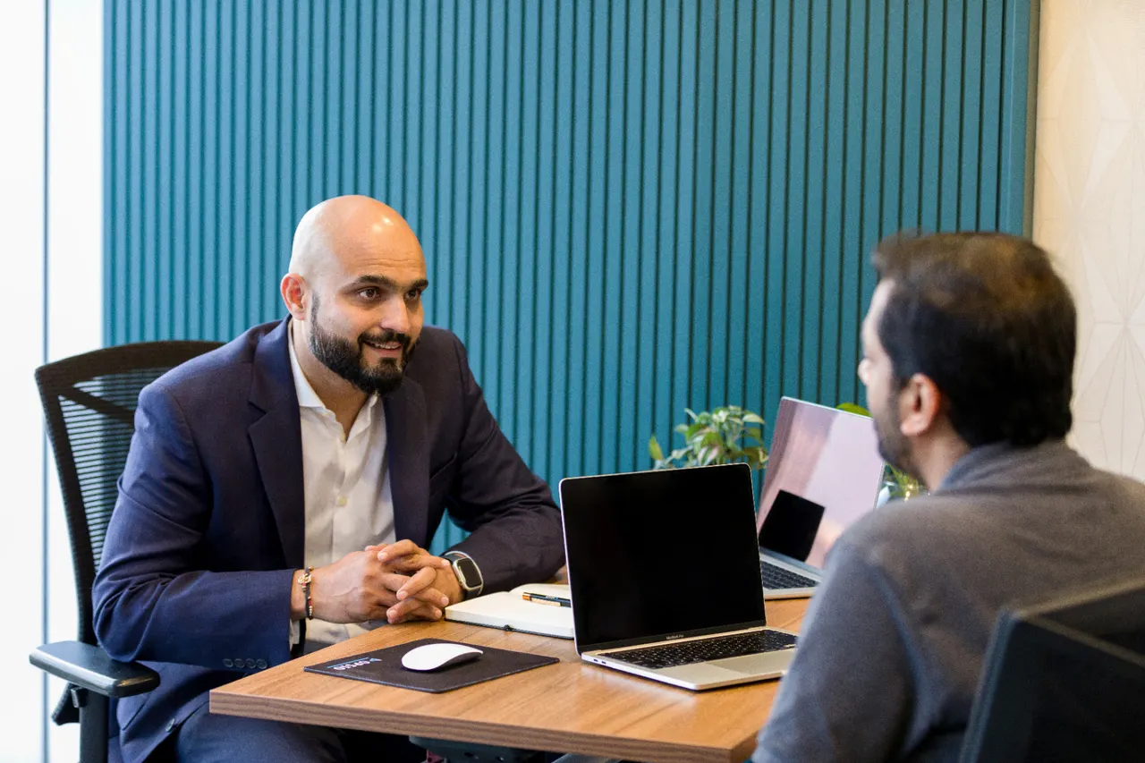 Opsio cloud advisor meeting with a customer in the Bengaluru office